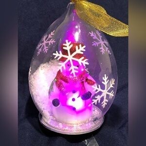 Snowman lights up ornament